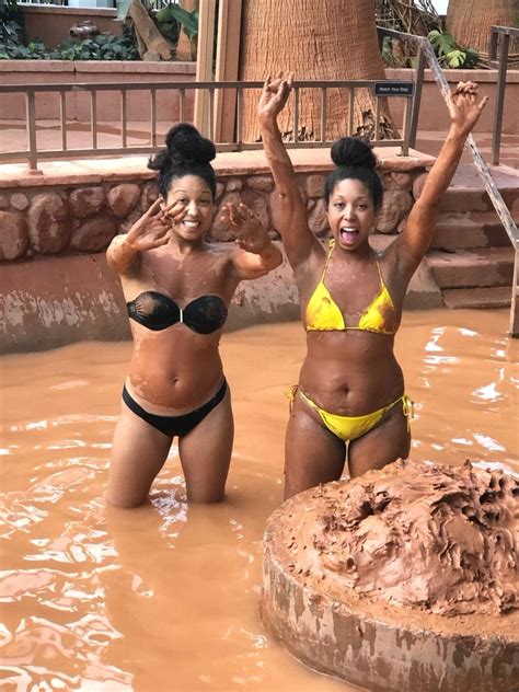 Black women in the mud bath at Glen Ivy Hot Springs Club Mud - Honey + Lime