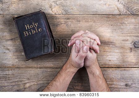 Bible Praying Hands Image & Photo (Free Trial) | Bigstock