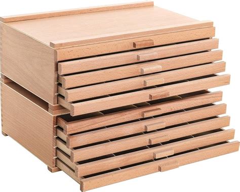 four wooden drawers stacked on top of each other