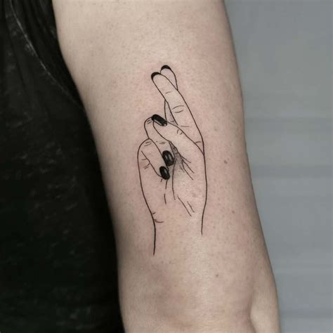 Crossed Fingers Tattoo by Maud Darmaun