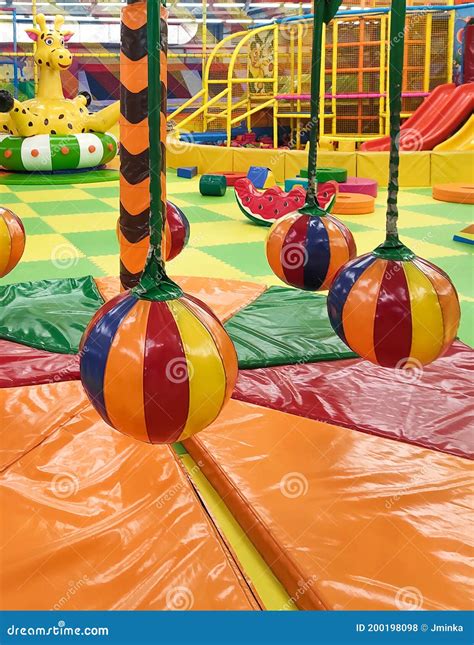 Playground Indoor with Balls, Slides and Tramplines Stock Photo - Image ...