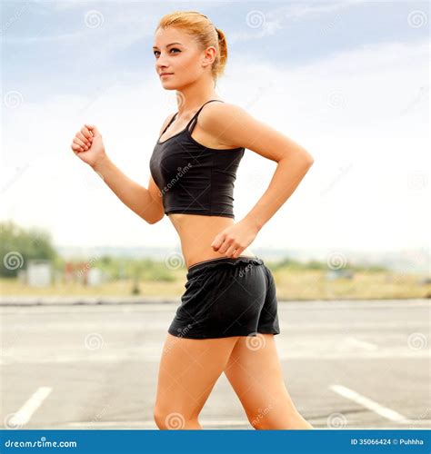 Athletic Runner Training In A Park For Marathon. Fitness Girl Ru Stock Photo - Image: 35066424