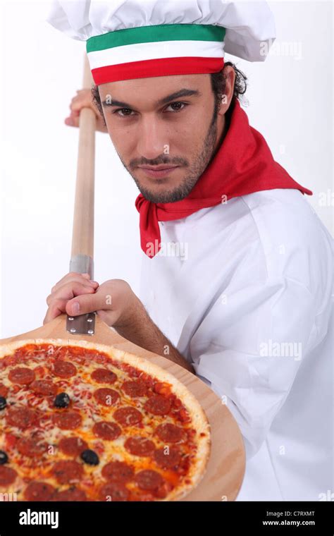 Italian pizza chef Stock Photo - Alamy
