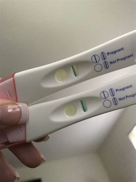 CD25, 10DPO, Equate Early Result PT. Is this positive?! I took 2 and they both have faint lines ...