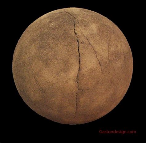 an image of a large rock with cracks in it's surface on a black background