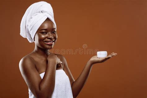 Skin Care Cosmetics. Young Beautiful Black Woman Holding Jar of Moisturising Cream Stock Photo ...