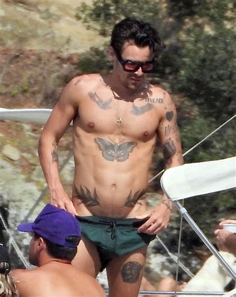 Harry Styles flashes new tattoo seemingly dedicated to ex Olivia Wilde