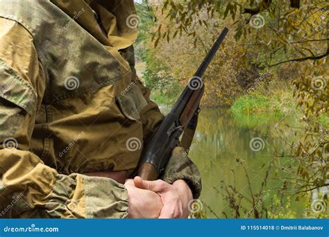 Man Hunting with a Hunting Rifle. Copy Space Stock Photo - Image of ...