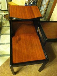 One of the black and tan end tables, showing the lovely wood grain that was lost beneath varnish ...