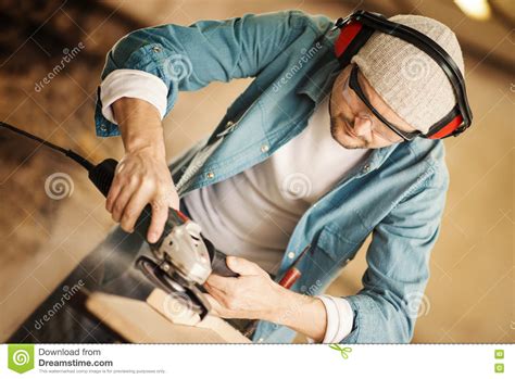 Carpenter Working with Power Sander Stock Photo - Image of occupation ...