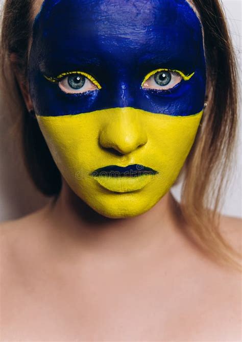 Colors of Ukrainian Flag on Face. Stock Image - Image of help, girl: 242818259