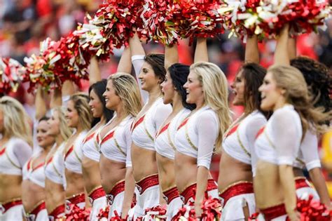 KANSAS CITY, MO - SEPTEMBER 25: Kansas City Chiefs cheerleaders celebrate after a touchdown ...