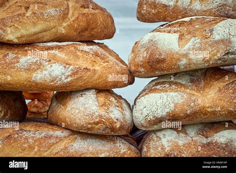 A stack of artisan bread loaves - detail Stock Photo - Alamy