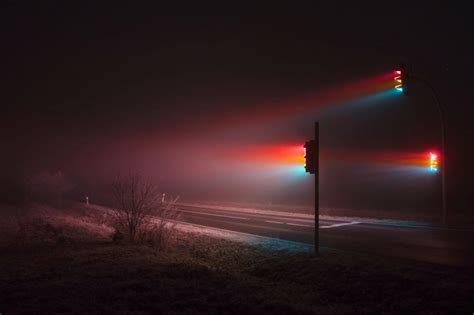 Street Light Art: Traffic Signals Emit Surreal Rainbow Streams in Hazy City - WebUrbanist