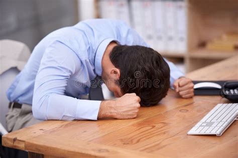 When Frustration Reaches Its Peak. a Businessman Banging His Head on the Desk. Stock Image ...