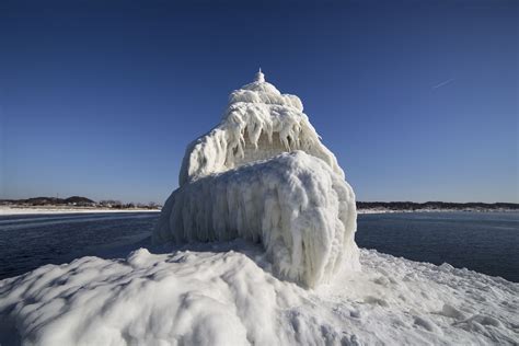 Fierce winter storms cause surreal ice formations in Michigan - AOL UK Travel