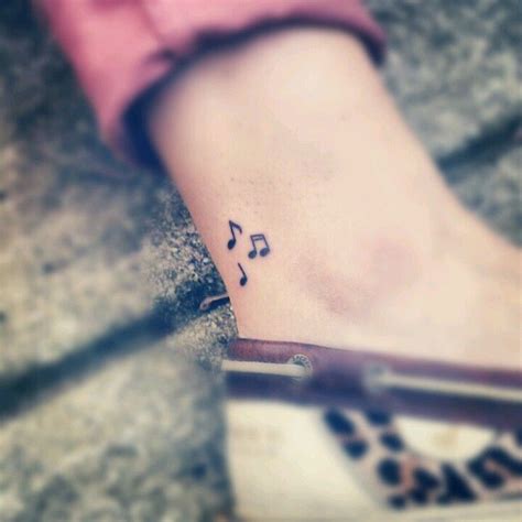 i don't usually go for musical notes as tats, but these are cute Unique Tattoos For Women ...