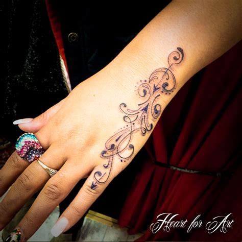 Hand Tattoos for Women.16 | Tattooton