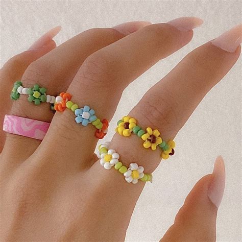 custom beaded flower rings! - $11 EACH or three... - Depop | Beaded jewelry diy, Diy beaded ...