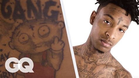 21 Savage Breaks Down His Tattoos | GQ - YouTube