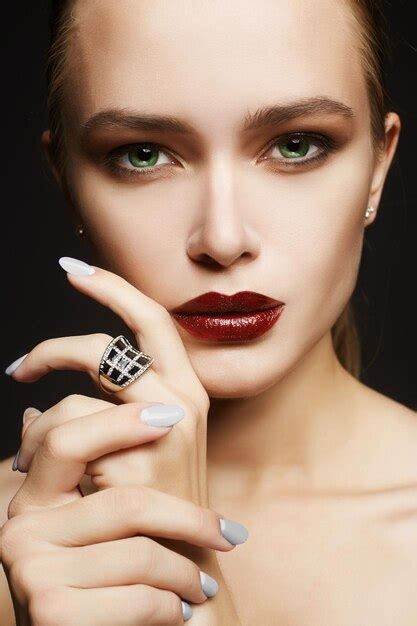 Premium Photo | Beautiful girl face makeupwoman with jewelry ring