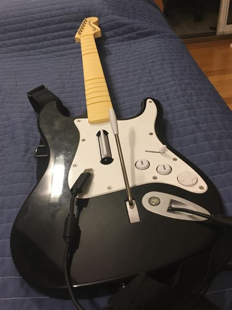 Can I play rock band 4 in the PS4 with an Xbox guitar with the usb cable? This one: : r/Rockband