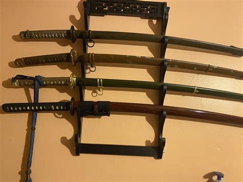 My katana collection so far : r/Katanas