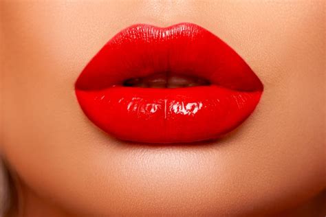 Red Lip gloss. Beautiful natural lips Red color. Sexy Lips. Beautiful Make-up Closeup. Lip Gloss ...