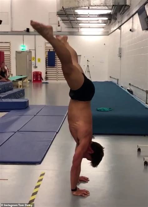 Tom Daley shows off his handstand talents as he perfects gymnastic ...