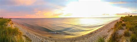 Missing the colorful beaches of Ludington this morning : r/Michigan