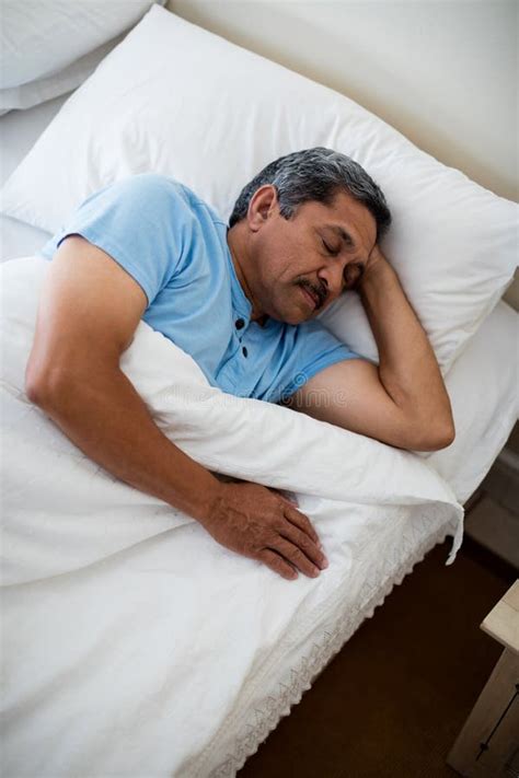 Senior Man Sleeping on Bed in Bedroom Stock Photo - Image of pillow, sheet: 84098436