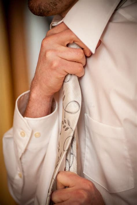 Male Hands Setting the Tie Straight. Stock Image - Image of blue, dress: 187954117