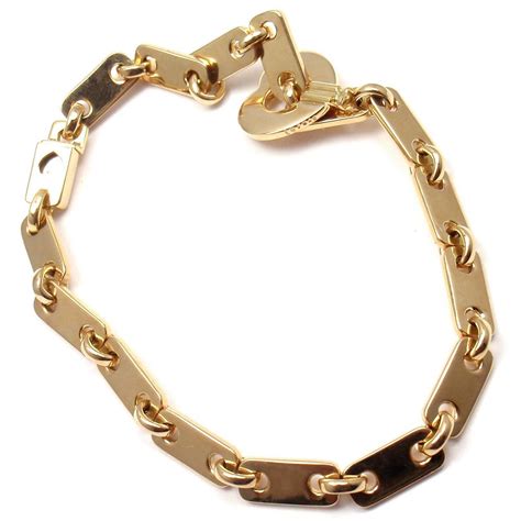 Cartier Gold Heart Lock Charm Link Bracelet at 1stdibs