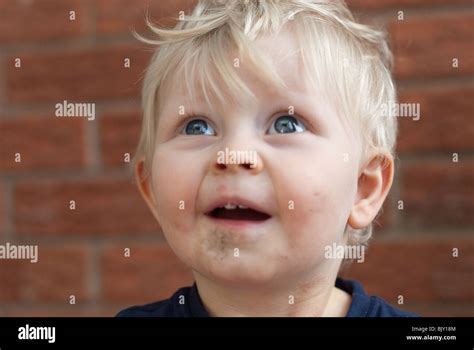 Child with dirty face Stock Photo - Alamy