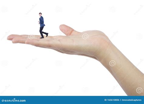 Tiny Man Trapped and Being Held by Giant Female Hands Stock Photo ...