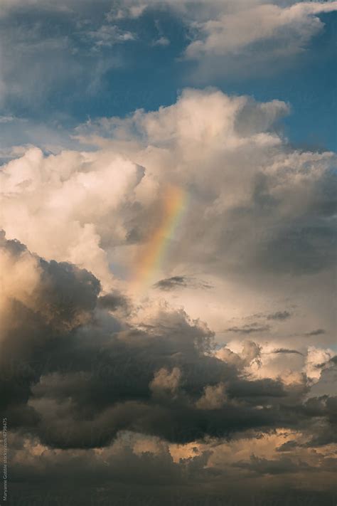 "Rainbow And Clouds In Sky" by Stocksy Contributor "Maryanne Gobble ...