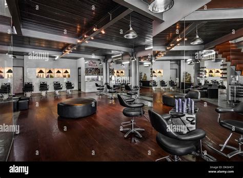 Hairdressing salon interior chairs mirrors beauty floor wood wooden Stock Photo: 63674491 - Alamy