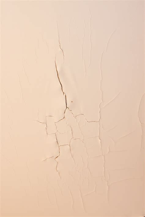 Cracked Paint on Ceiling from Water Damage - Valley Roofing