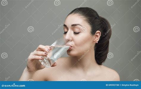 Young Woman Drinking Water from the Glass Stock Photo - Image of lifestyle, natural: 69592738