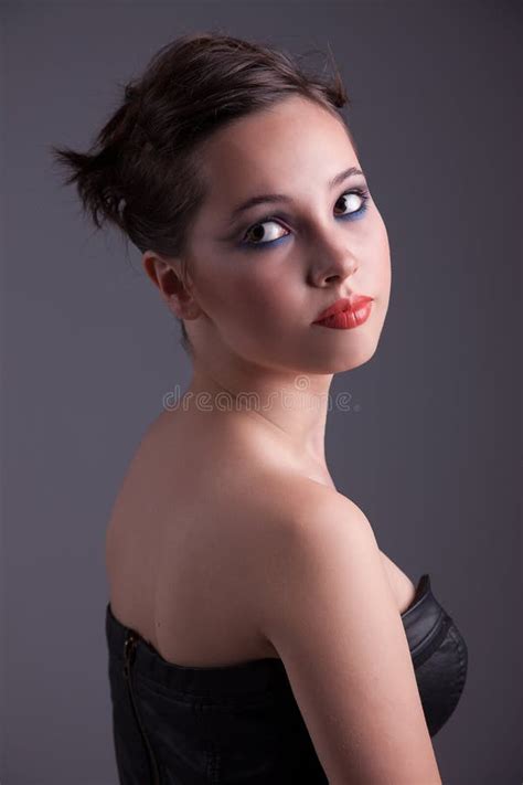 Serious Beautiful Woman, Looking Back Stock Photography - Image: 26374802