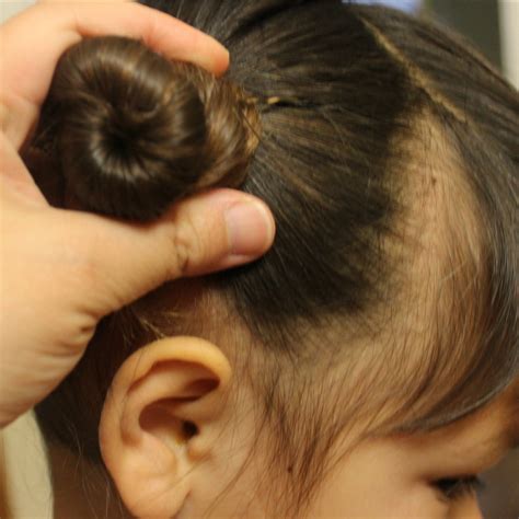 Traditional Chinese Children’s Hairstyle: Two Buns on the Sides Tutorial – Castle of Costa Mesa