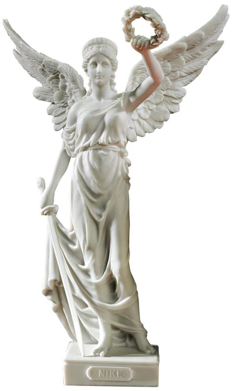 an angel statue holding a wreath in its hand and standing on a white base with wings