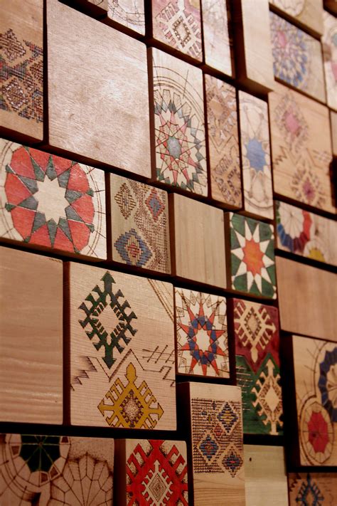 Wooden mosaic is the result of reusing what is claimed to be abandoned as our base material ...