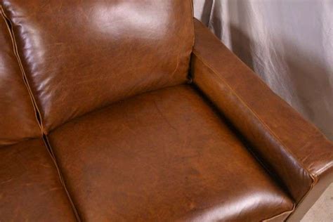 Brown top grain Italian leather sofa; 205-535 - R.H. Lee & Co. Auctioneers