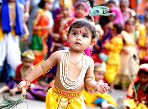 A child dressed up as Lord Krishna during the Sree Krishna Janmashtami celebrations