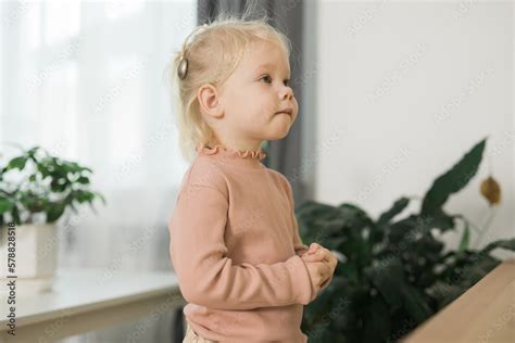 Deaf child girl with cochlear implant studying to hear sounds copy ...