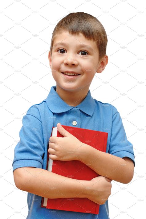 Boy holding book | People Images ~ Creative Market