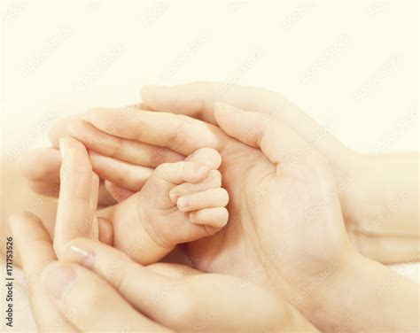 Newborn Baby Hand in Family Hands, Parents Hold Protect New Born Kid ...