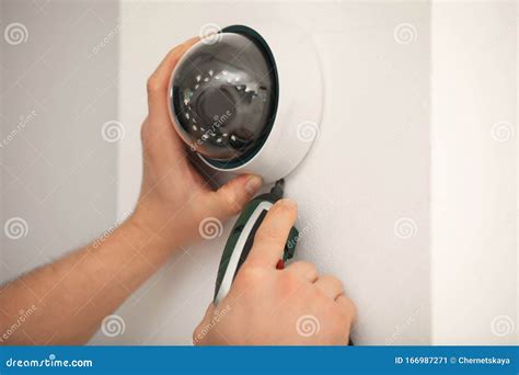 Technician Installing CCTV Camera on Wall Stock Image - Image of modern ...