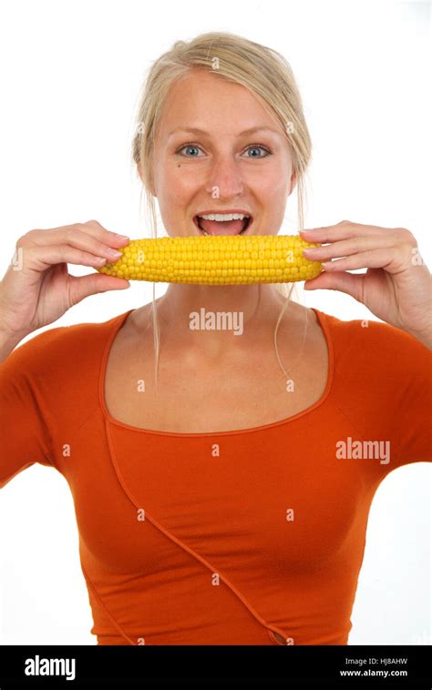 Woman with cooked maize cob Stock Photo - Alamy